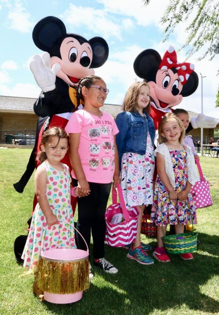 It's a very happy Sunday as youngsters visit Lemoore Downtown for Easter gifts Minnie and Mickey Mouse were on hand for photos with kids and adults.